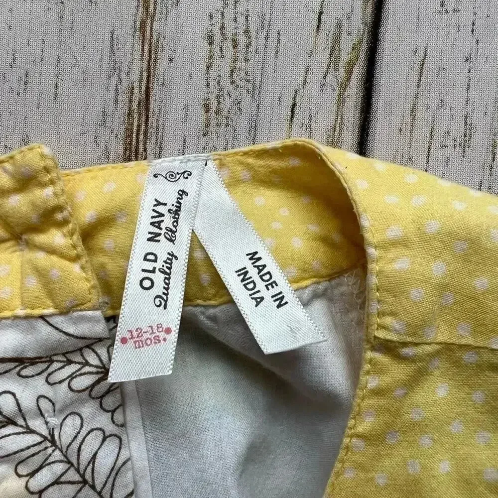 Old Navy yellow floral short sleeve top with rolled sleeves Size 12-18 months
